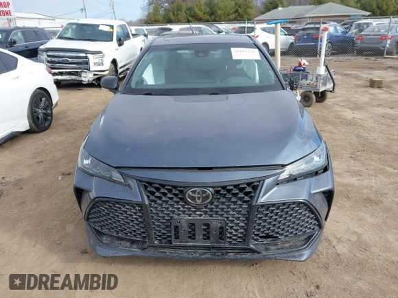 2019 Toyota Avalon XLE z VIN 4T1BZ1FB3KU024135, wystawiony jako IAAI lot #41887321 z przebiegiem 80 547 mil mil oraz . Historia ofert i sprzedaży dostępna na DreamBid. Obrazek 12.