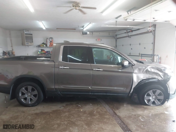 2020 Honda Ridgeline RTL-E with VIN 5FPYK3F75LB001516, listed as a IAAI auction lot 41605859 with 93,902 mi miles. Bid and sale history available at carsss.com. Image 13.
