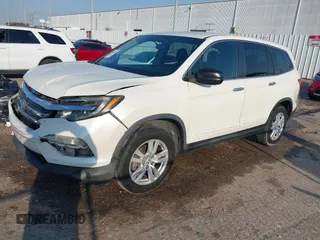 2016 Honda Pilot LX with VIN 5FNYF5H13GB016698, listed as a IAAI auction lot 41685173 with 188,001 mi miles and . Bid and sale history available at DreamBid. Image 19.