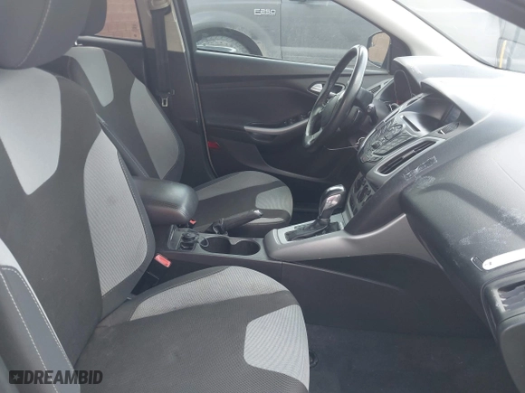 2012 Ford Focus SE with VIN 1FAHP3K24CL379060, listed as a IAAI auction lot 41955080 with 149,018 mi miles. Bid and sale history available at carsss.com. Image 5.