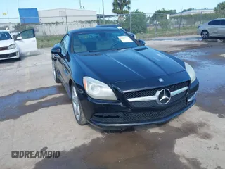 2013 Mercedes-Benz SLK-Class SLK 250 with VIN WDDPK4HA5DF059891, listed as a IAAI auction lot 42015777 with 79,255 mi miles. Bid and sale history available at carsss.com. Image 1.