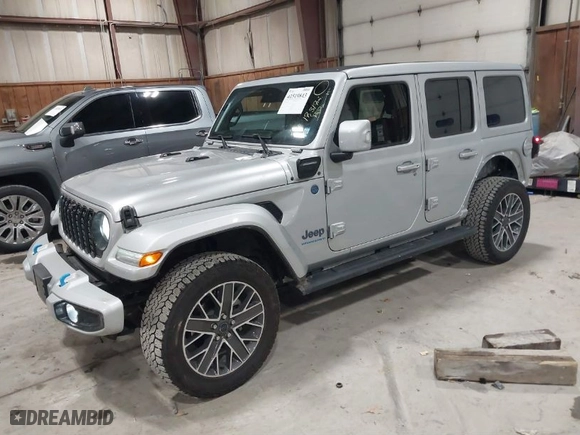 2024 Jeep Wrangler 4xe High Altitude with VIN 1C4RJXU6XRW218114, listed as a IAAI auction lot 41519843 with 17,317 mi miles. Bid and sale history available at carsss.com. Image 2.