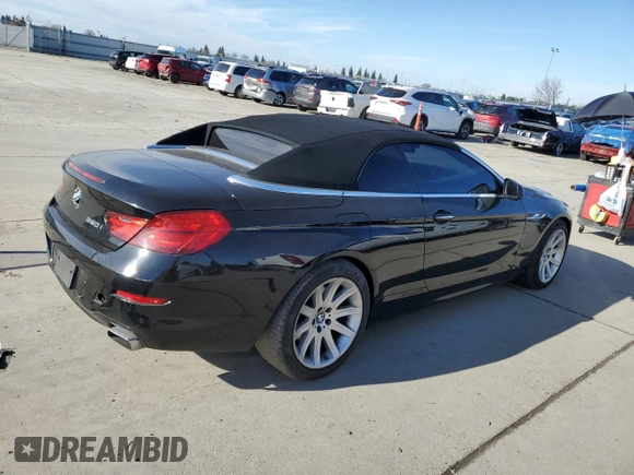 2012 BMW 6 Series 650i z VIN WBALZ3C51CDL72422, wystawiony jako Copart lot #87447914 z przebiegiem 115 376 mil mil oraz Szkody całkowita. Historia ofert i sprzedaży dostępna na DreamBid. Obrazek 3.