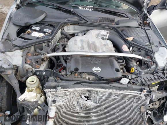2003 Nissan 350Z Touring z VIN JN1AZ34E33T003711, wystawiony jako IAAI lot #41351191 z przebiegiem 167 503 mil mil oraz . Historia ofert i sprzedaży dostępna na DreamBid. Obrazek 10.