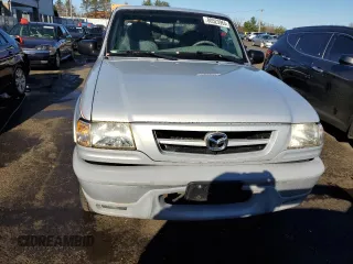 2002 Mazda B-Series 2WD Truck DS with VIN 4F4YR16U12TM05057, listed as a Copart auction lot 80523964 with 63,219 mi miles and Salvage Title. Bid and sale history available at carsss.com. Image 5.