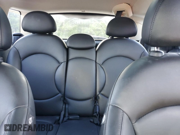 2013 MINI Countryman S ALL4 with VIN WMWZC5C53DWM16045, listed as a Copart auction lot 56057555 with 167,263 mi miles and Salvage title. Bid and sale history available at DreamBid. Image 10.
