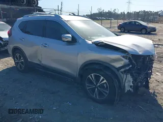 2019 Nissan Rogue SV with VIN JN8AT2MT9KW263300, listed as a IAAI auction lot 41853629 with 104,654 mi miles. Bid and sale history available at carsss.com. Image 1.
