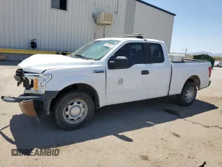 2018 Ford F-150 XL with VIN 1FTEX1CB1JKC58165, listed as a Copart auction lot 61529075 with 105,771 mi miles and Salvage title. Bid and sale history available at DreamBid. Image 1.