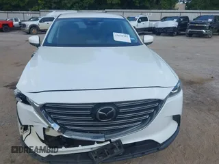 2018 Mazda CX-9 Touring with VIN JM3TCACY7J0222569, listed as a IAAI auction lot 42670932 with 130,644 mi miles and . Bid and sale history available at DreamBid. Image 12.