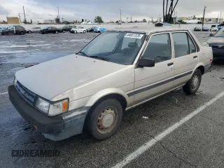 1987 Toyota Corolla с VIN JT2AE82E9H3531391, выставлен на аукционе Copart как лот 44657375 с пробегом 240 376 миль миль и Чистый • Clean title. История ставок и продаж доступна на DreamBid. Изображение 1.