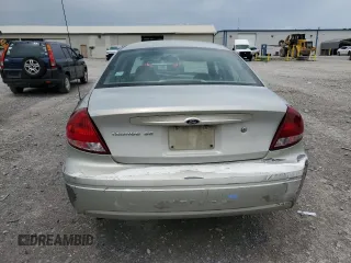 2006 Ford Taurus SE z VIN 1FAFP53U56A151555, wystawiony jako Copart lot #55227665 z przebiegiem 146 109 mil mil oraz Szkoda całkowita • Salvage title. Historia ofert i sprzedaży dostępna na DreamBid. Obrazek 6.