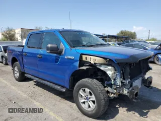 2018 Ford F-150 XL with VIN 1FTEW1EGXJKD26409, listed as a Copart auction lot 59403645 with 122,373 mi miles and Salvage title. Bid and sale history available at DreamBid. Image 4.