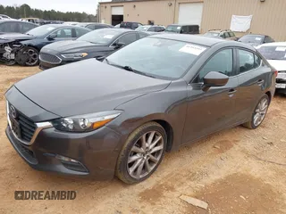2017 Mazda 3 Touring z VIN JM1BN1V77H1101001, wystawiony jako IAAI lot #41393592 z przebiegiem 77 566 mil mil oraz . Historia ofert i sprzedaży dostępna na DreamBid. Obrazek 17.