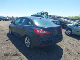 2013 Ford Focus Titanium with VIN 1FADP3J22DL106166, listed as a IAAI auction lot 42233351 with 108,300 mi miles and . Bid and sale history available at carsss.com. Image 3.