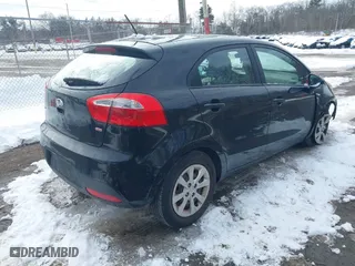 2013 Kia Rio LX with VIN KNADM5A37D6194117, listed as a IAAI auction lot 41522784 with 125,325 mi miles. Bid and sale history available at carsss.com. Image 4.