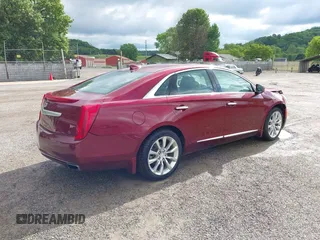 2016 Cadillac XTS Luxury Collection with VIN 2G61M5S31G9133513, listed as a IAAI auction lot 42289442 with 68,613 mi miles and . Bid and sale history available at DreamBid. Image 4.