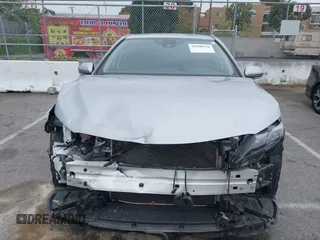 2023 Toyota Camry SE with VIN 4T1G11AKXPU809876, listed as a IAAI auction lot 42100546 with 35,055 mi miles and . Bid and sale history available at DreamBid. Image 12.