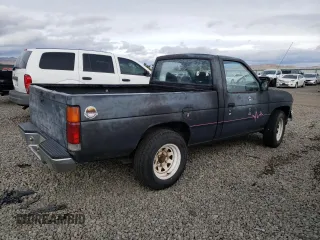 1991 Nissan Frontier with VIN 1N6SD11S9MC419923, listed as a Copart auction lot 85189314 with 245,003 mi miles and Salvage title. Bid and sale history available at DreamBid. Image 3.