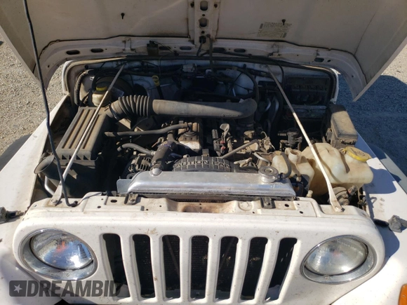 2006 Jeep Wrangler Sport Right Hand Drive with VIN 1J4F449S76P747454, listed as a Copart auction lot 77819214 with 184,763 mi miles and Salvage Title. Bid and sale history available at carsss.com. Image 11.