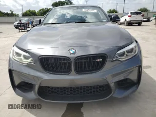 2018 BMW M2 z VIN WBS1J5C50JVD37726, wystawiony jako Copart lot #59069224 z przebiegiem 76 260 mil mil oraz Czysty tytuł • Clean title. Historia ofert i sprzedaży dostępna na DreamBid. Obrazek 5.