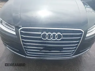 2015 Audi A8 3.0T with VIN WAU3GAFD7FN037726, listed as a IAAI auction lot 41793699 with 100,773 mi miles and . Bid and sale history available at DreamBid. Image 6.
