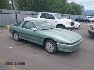 1987 Toyota Supra z VIN JT2MA70L3H0040899, wystawiony jako IAAI lot #42772961 z przebiegiem 462 365 mil mil oraz . Historia ofert i sprzedaży dostępna na DreamBid. Obrazek 1.