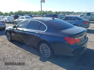 2011 BMW 7 Series 740i with VIN WBAKA4C52BC392112, listed as a IAAI auction lot 41736939 with 125,953 mi miles and . Bid and sale history available at carsss.com. Image 3.