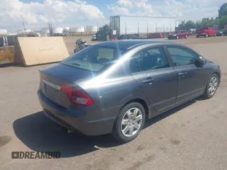 2009 Honda Civic LX z VIN 19XFA165X9E039697, wystawiony jako IAAI lot #39794063 z przebiegiem 169 439 mil mil oraz . Historia ofert i sprzedaży dostępna na DreamBid. Obrazek 4.