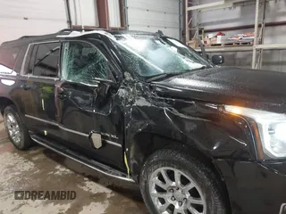 2015 GMC Yukon XL SLT with VIN 1GKS2HKC9FR175011, listed as a IAAI auction lot 41510519 with 194,136 mi miles. Bid and sale history available at carsss.com. Image 6.