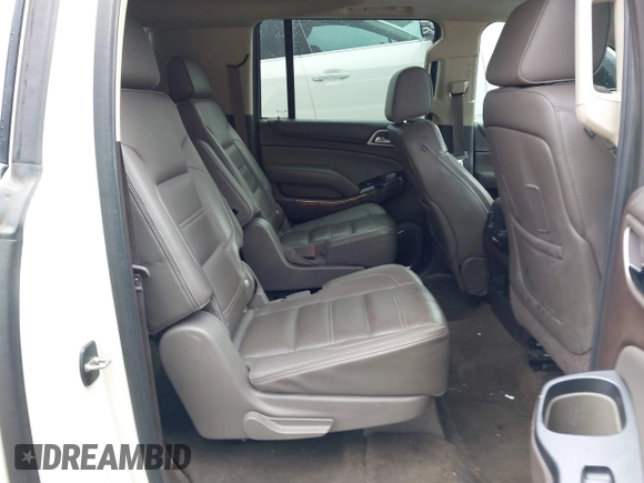2015 GMC Yukon XL Denali with VIN 1GKS2JKJ2FR590502, listed as a IAAI auction lot 41758575 with 129,777 mi miles. Bid and sale history available at carsss.com. Image 8.
