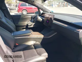 2022 Tesla Model X with VIN 7SAXCDE58NF342776, listed as a IAAI auction lot 42042369 with 70,301 mi miles and . Bid and sale history available at carsss.com. Image 5.