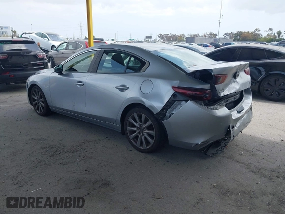2020 Mazda 3 Select with VIN 3MZBPACL6LM131481, listed as a IAAI auction lot 42118795 with 104,102 mi miles and . Bid and sale history available at DreamBid. Image 3.