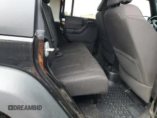 2014 Jeep Wrangler Unlimited Sport with VIN 1C4BJWDG6EL320381, listed as a Copart auction lot 51051704 with 163,127 mi miles and Salvage Title. Bid and sale history available at carsss.com. Image 12.