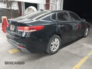 2016 Kia Optima LX with VIN 5XXGT4L3XGG038671, listed as a IAAI auction lot 42421622 with 105,024 mi miles and . Bid and sale history available at DreamBid. Image 4.