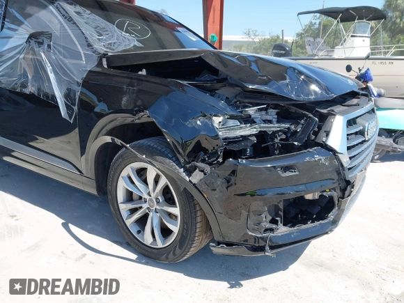 2017 Audi Q7 Premium Plus with VIN WA1LHAF75HD040203, listed as a IAAI auction lot 42064687 with 100,845 mi miles and . Bid and sale history available at DreamBid. Image 6.