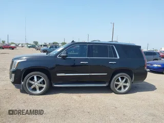 2017 Cadillac Escalade z VIN 1GYS3AKJ4HR338806, wystawiony jako IAAI lot #41941193 z przebiegiem 119 865 mil mil oraz . Historia ofert i sprzedaży dostępna na DreamBid. Obrazek 14.