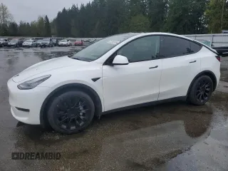 2021 Tesla Model Y Long Range with VIN 5YJYGAEE2MF115988, listed as a Copart auction lot 52206535 with 53,911 mi miles and Salvage Title. Bid and sale history available at DreamBid. Image 1.