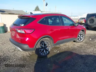 2020 Ford Escape SE Sport Hybrid with VIN 1FMCU0BZ0LUC58668, listed as a IAAI auction lot 41959552 with 77,838 mi miles and . Bid and sale history available at DreamBid. Image 4.