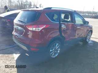 2014 Ford Escape SE with VIN 1FMCU9GX1EUE23044, listed as a IAAI auction lot 41597818 with 165,348 mi miles. Bid and sale history available at carsss.com. Image 4.