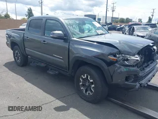 2023 Toyota Tacoma 4WD SR with VIN 3TMCZ5AN7PM534257, listed as a IAAI auction lot 41524436 with 28,886 mi miles. Bid and sale history available at carsss.com. Image 1.