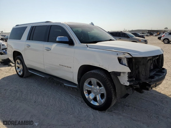 2017 Chevrolet Suburban Premier with VIN 1GNSCJKC7HR128988, listed as a Copart auction lot 73958784 with 121,662 mi miles and Salvage Title. Bid and sale history available at carsss.com. Image 4.