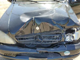 2001 Mercedes-Benz M-Class with VIN 4JGAB54E61A232157, listed as a Copart auction lot 53482584 with 137,549 mi miles and Salvage Title. Bid and sale history available at carsss.com. Image 13.