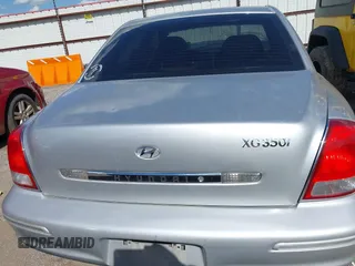 2003 Hyundai XG z VIN KMHFU45E13A261934, wystawiony jako IAAI lot #42121245 z przebiegiem 210 498 mil mil oraz . Historia ofert i sprzedaży dostępna na DreamBid. Obrazek 16.
