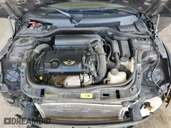 2014 MINI Convertible S with VIN WMWZP3C55ET706573, listed as a Copart auction lot 52325705 with 125,076 mi miles and Salvage Title. Bid and sale history available at DreamBid. Image 11.