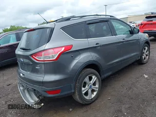2013 Ford Escape SE with VIN 1FMCU9GX9DUA57901, listed as a IAAI auction lot 42367615 with 140,000 mi miles and . Bid and sale history available at DreamBid. Image 4.