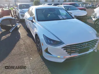 2021 Hyundai Sonata Hybrid Blue with VIN KMHL24JJ5MA035473, listed as a IAAI auction lot 42003958 with 11,495 mi miles. Bid and sale history available at carsss.com. Image 1.
