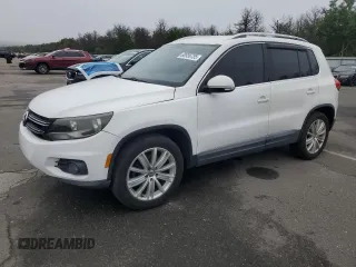 2013 Volkswagen Tiguan SE z VIN WVGAV3AX1DW574009, wystawiony jako Copart lot #60936735 z przebiegiem 121 624 mil mil oraz Czysty tytuł • Clean title. Historia ofert i sprzedaży dostępna na DreamBid. Obrazek 1.