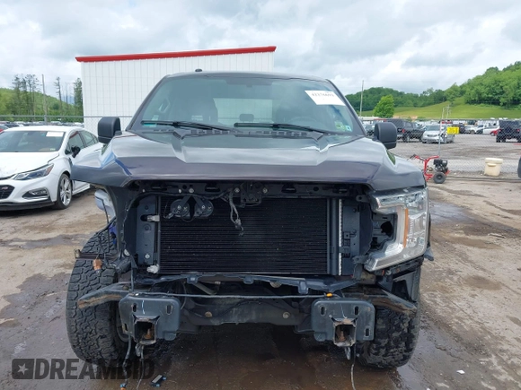 2018 Ford F-150 XL with VIN 1FTEW1E55JFE21905, listed as a IAAI auction lot 42276693 with 77,260 mi miles and . Bid and sale history available at DreamBid. Image 13.