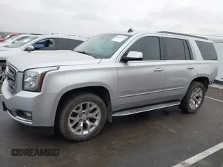 2015 GMC Yukon SLT with VIN 1GKS2BKCXFR131919, listed as a IAAI auction lot 41664827 with 149,398 mi miles. Bid and sale history available at carsss.com. Image 15.