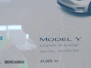 2022 Tesla Model Y Long Range z VIN 7SAYGDEE8NF374636, wystawiony jako IAAI lot #41545669 z przebiegiem 41 965 mil mil oraz . Historia ofert i sprzedaży dostępna na DreamBid. Obrazek 15.